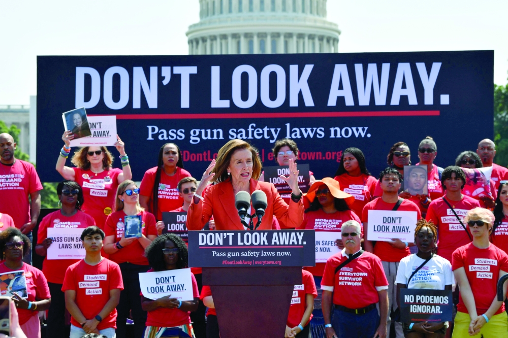 US Speaker of the House Nancy Pelosi, Democrat of California, speaks to activists protesting gun violence and demanding action from lawmakers, on Wednesday. - AFP