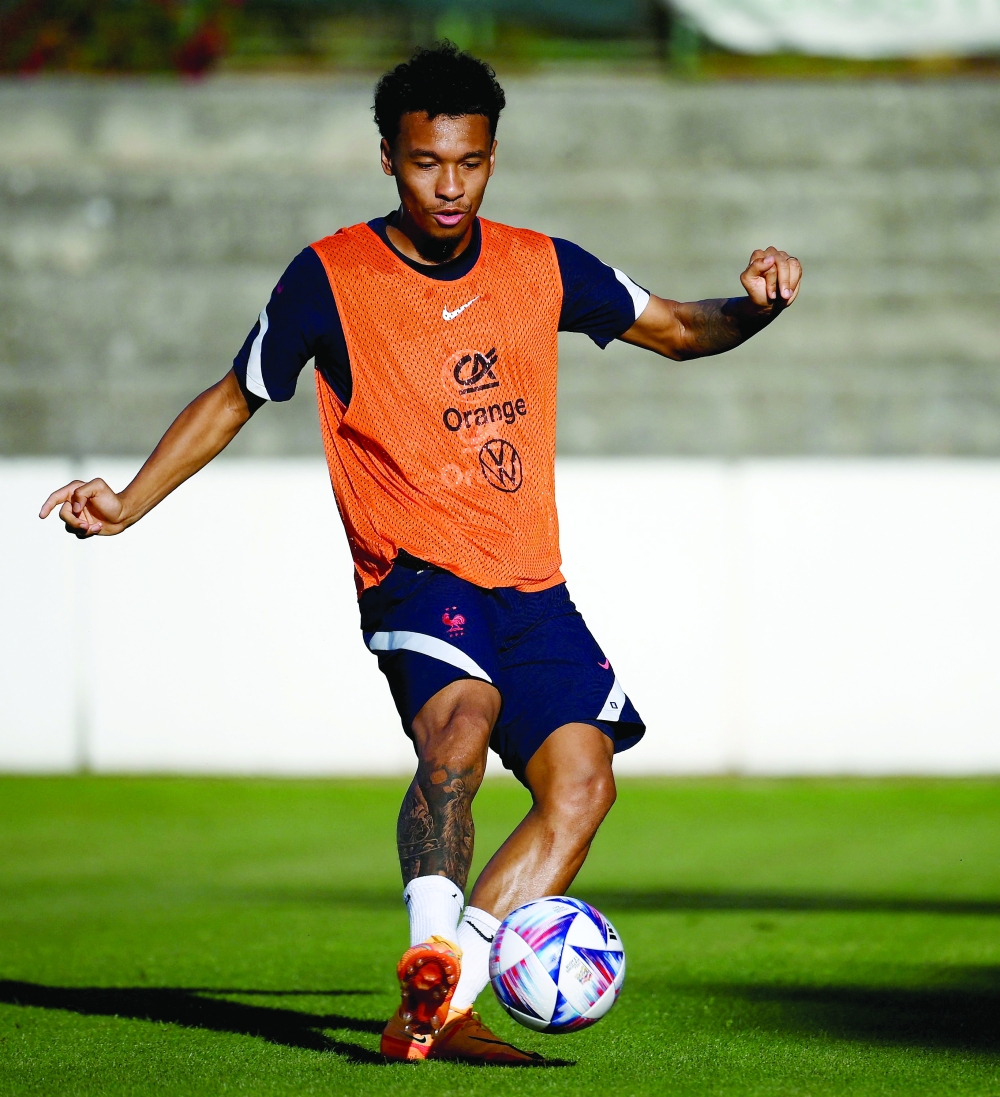 France midfielder Boubacar Kamara during a training session. -- AFP