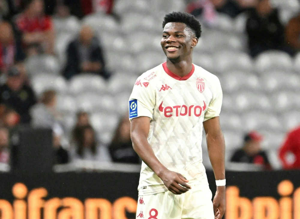 (FILES) In this file photo taken on May 6, 2022 Monaco's midfielder Aurelien Tchouameni celebrates after scoring during the French L1 football match between Lille OSC and AS Monaco at the Pierre Mauroy Stadium in Villeneuve d'Ascq, northern France.  Real Madrid formalized the arrival of Monaco's French midfielder Aurelien Tchouameni for six seasons on June 11, 2022 in a press release. (Photo by DENIS CHARLET / AFP)

