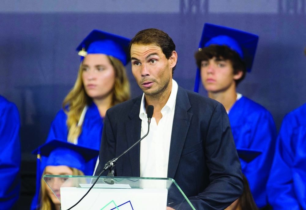 Spain's Rafael Nadal speaks during the graduation ceremony of the sixth promotion of the Rafa Nadal Academy in Manacor. -- AFP