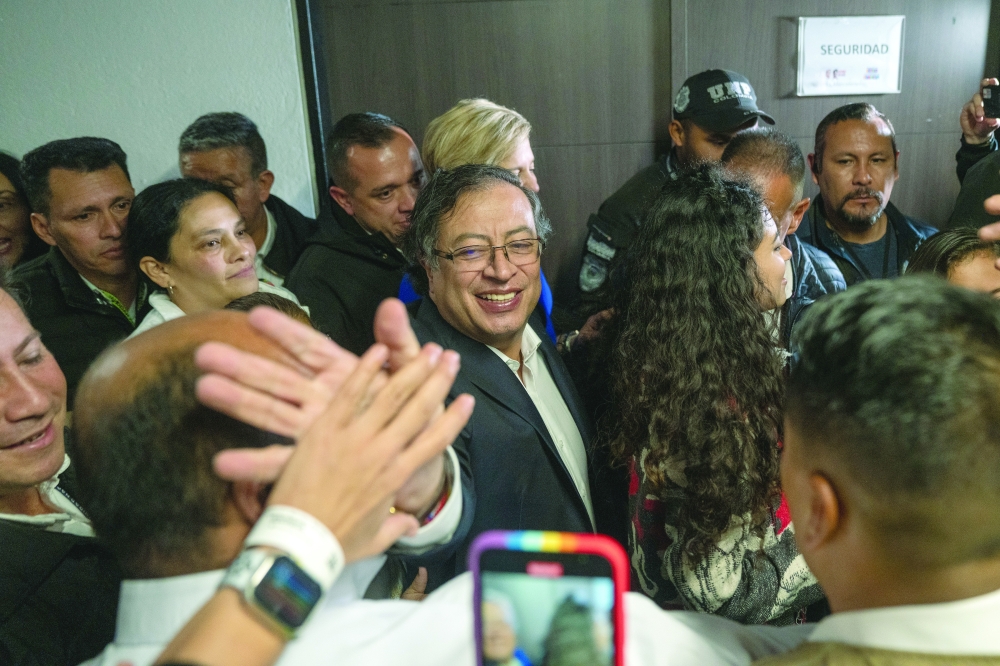 Gustavo Petro celebrates after winning the presidential election in Bogota.
