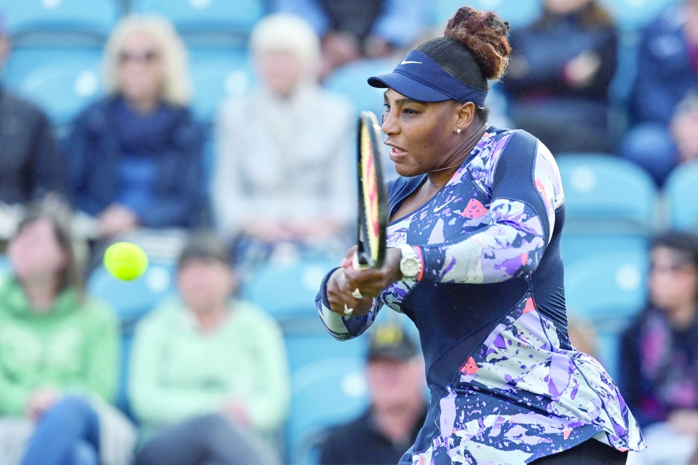 US player Serena Williams returns the ball to Spain's Sara Sorribes Tormo and Czech Republic's Marie Bouzkova. -- AFP