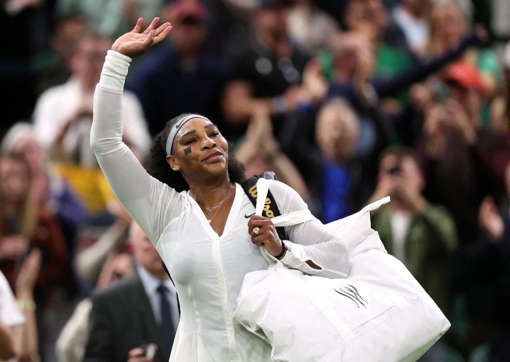 Serena Williams of the US leaves court after losing her first round match against France's Harmony Tan. --  Reuters