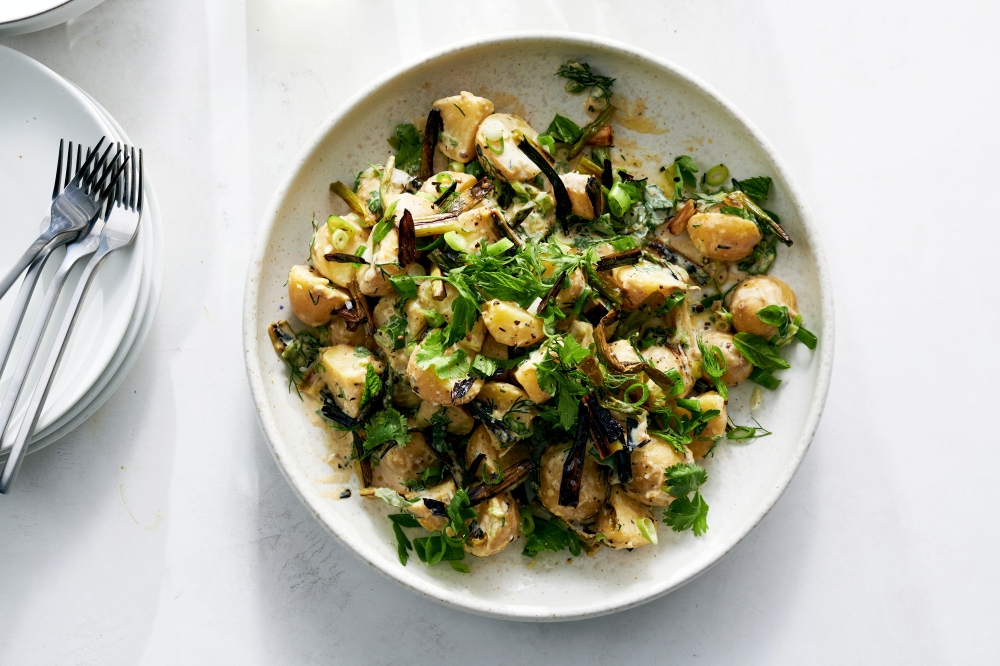 A creamy and vegan potato salad with tahini in New York, June 8, 2022. Food styled by Simon Andrews. (David Malosh/The New York Times)