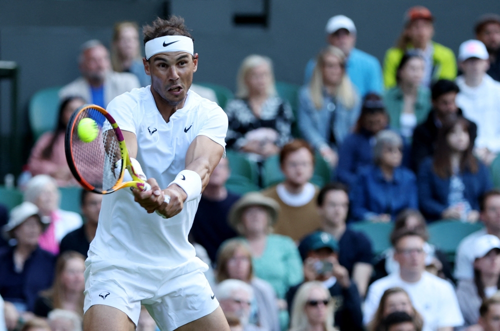 Tennis - Wimbledon - All England Lawn Tennis and Croquet Club, London, Britain - June 30, 2022 Spain's Rafael Nadal in action during his second round match against Lithuania's Ricardas Berankis REUTERS/Paul Childs