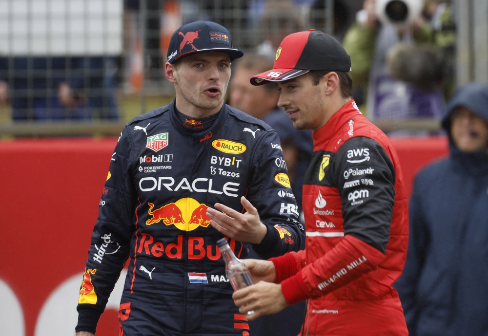 Red Bull's Max Verstappen and Ferrari's Charles Leclerc after qualifying in second and third place. -- Reuters