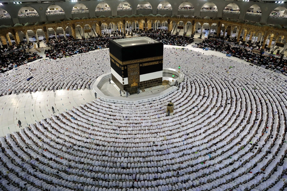Worshippers pray around the Kaaba at the Grand Mosque in the holy city of Mecca. - AFP