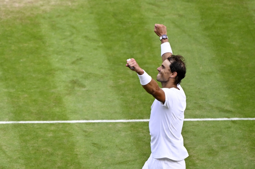 Spain's Rafael Nadal celebrates winning his quarter final match against Taylor Fritz of the US. -- Reuters