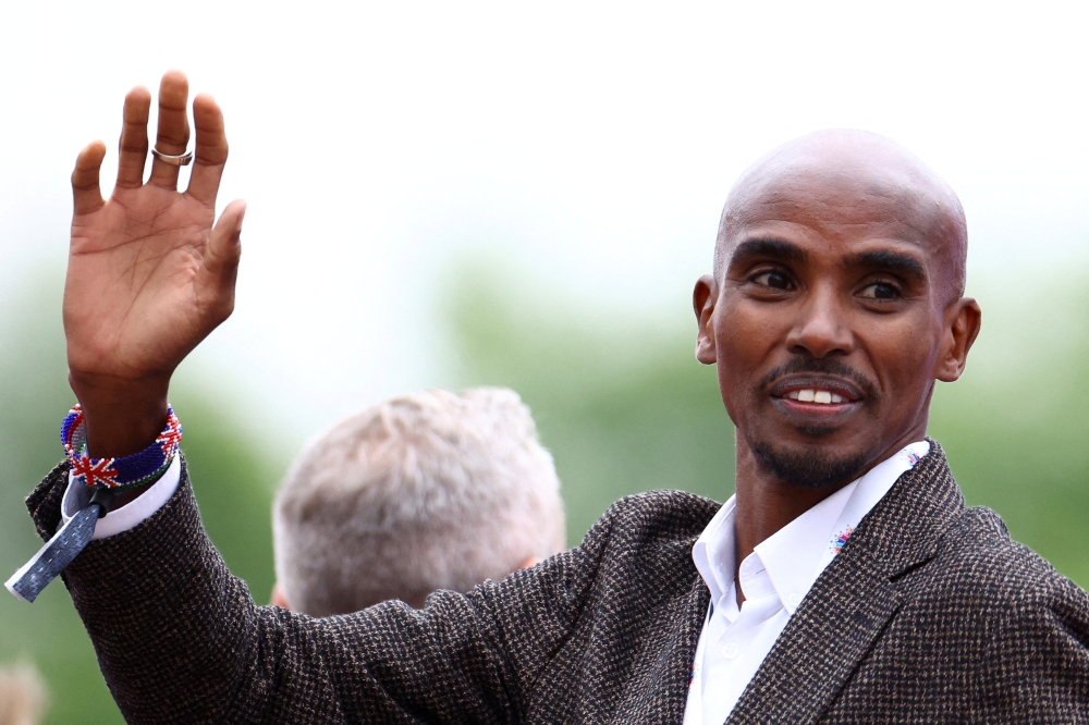 British track athlete Mo Farah attends the Platinum Jubilee Pageant, marking the end of the celebrations for the Platinum Jubilee of Britain's Queen Elizabeth, in London. -- Reuters