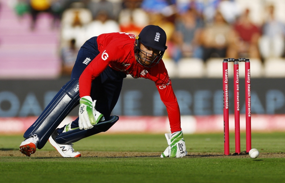England's Jos Buttler in action. -- Reuters