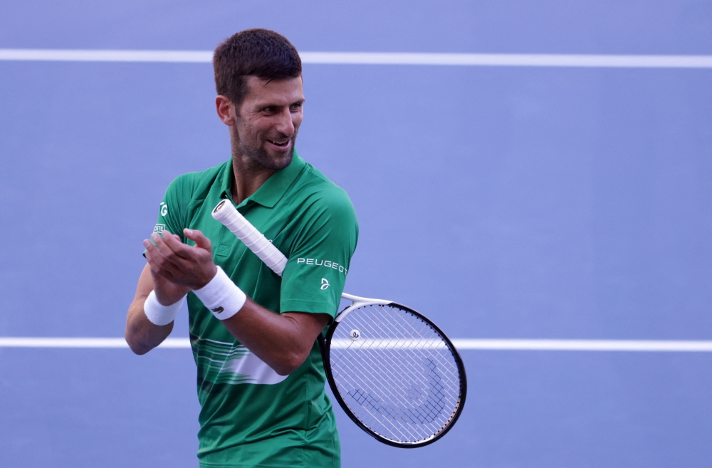 Novak Djokovic performs during the opening of a regional tennis centre that will prepare top tennis players for major tournaments, in Visoko, Bosnia. -- Reuters