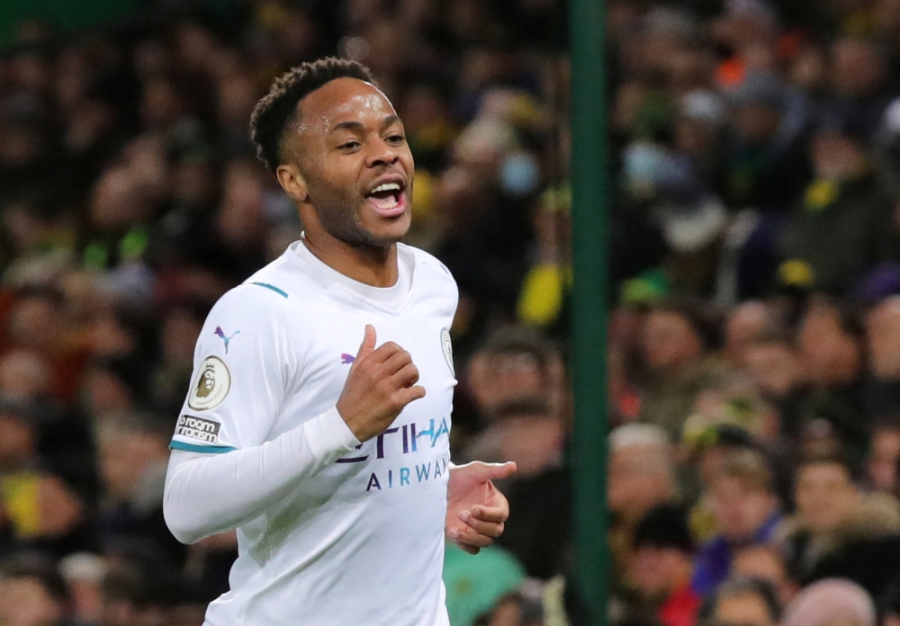Manchester City's Raheem Sterling celebrates scoring their first goal. -- Reuters