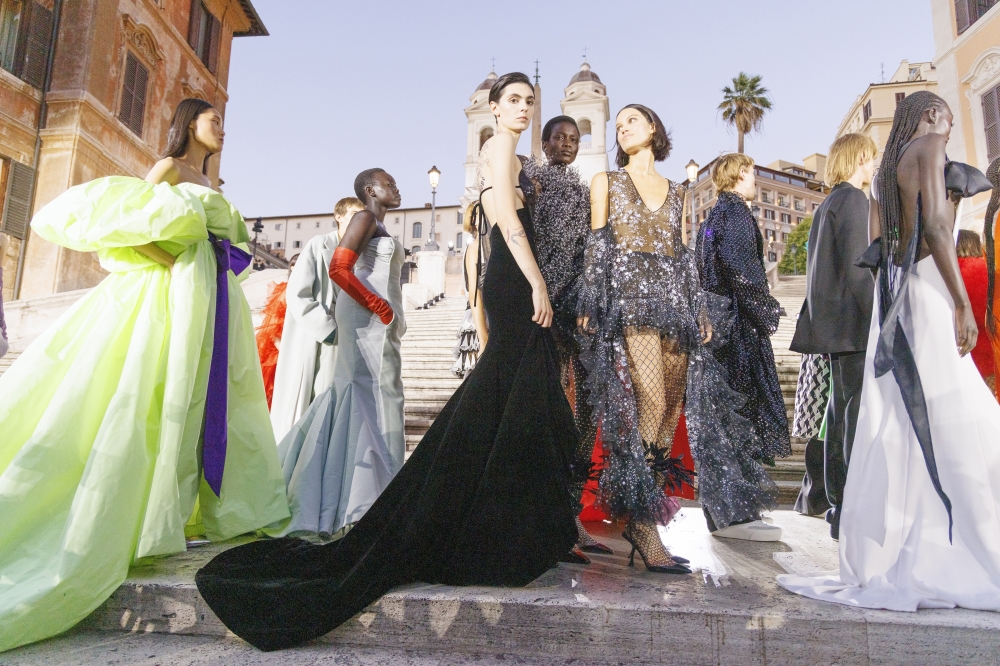 Models present looks at the Valentino couture fall 2022 fashion show in Rome, July 8, 2022. (Valerio Mezzanotti/The New York Times)