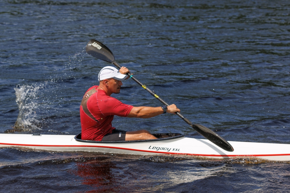 Mathew Skeels demonstrates proper paddling technique in Madrid, N.Y., June 16, 2022. (Bryan Bennett/The New York Times)