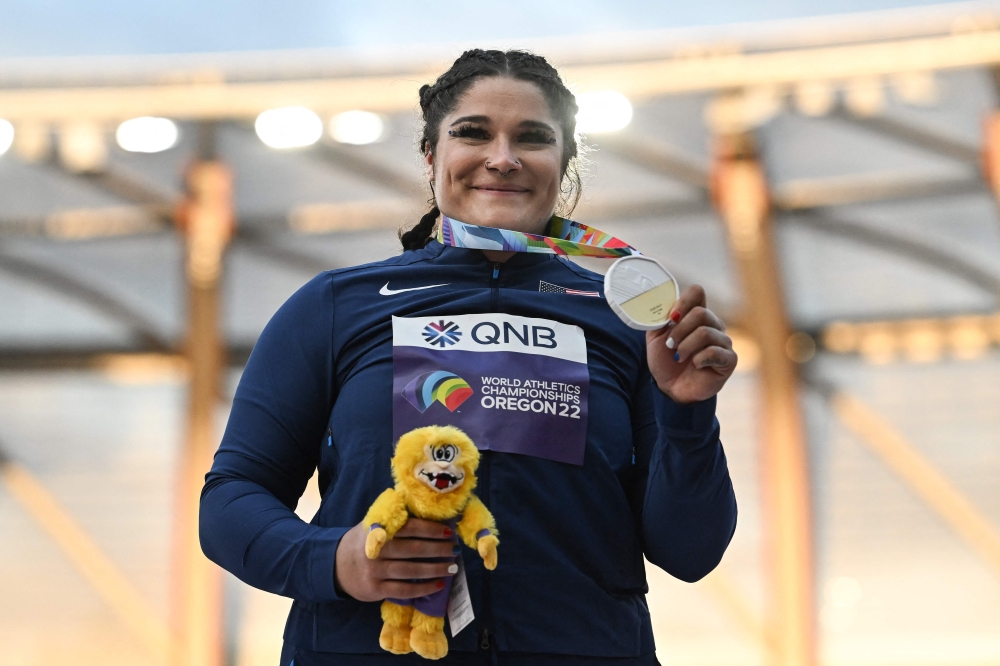Gold medallist USA's Chase Ealey poses on the podium during the medal ceremony for the women's shot put during the World Athletics Championships at Hayward Field in Eugene, Oregon on July 16, 2022.  (Photo by Ben Stansall / AFP)

