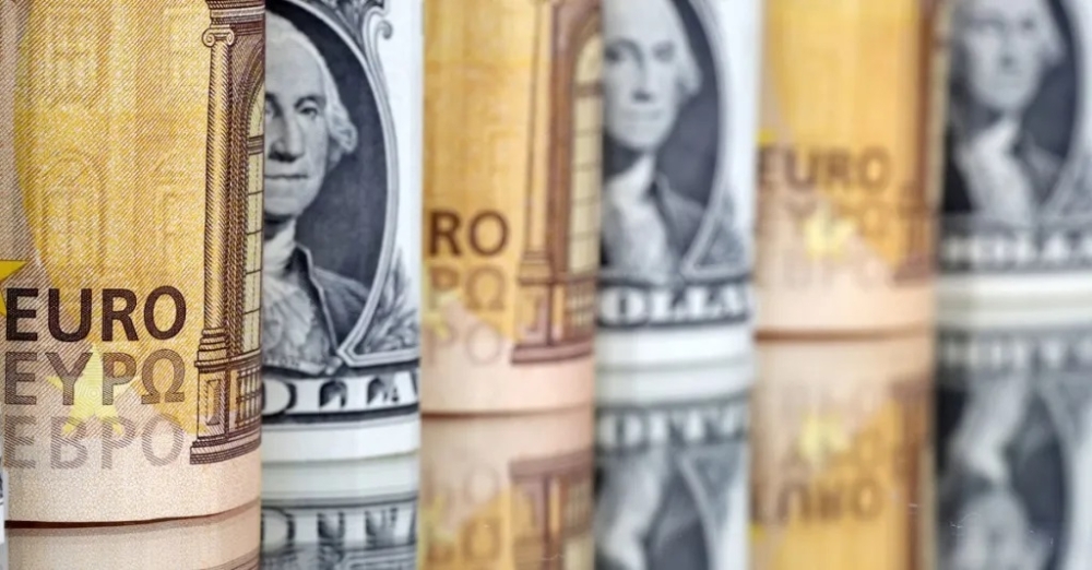 Stocks climb, euro inches higher in big week for markets