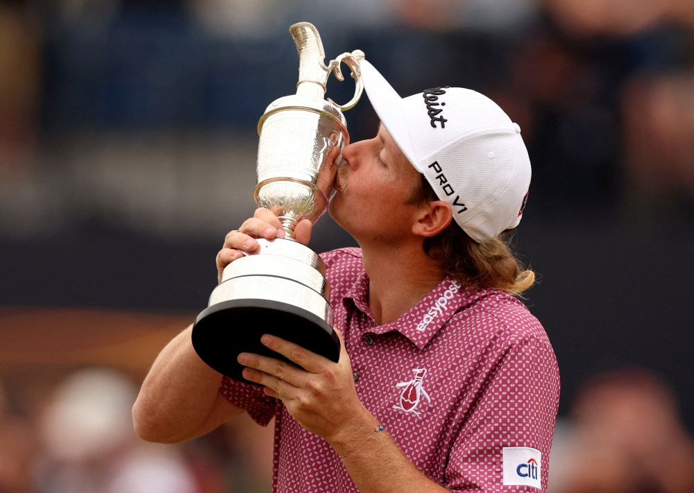 Australia's Cameron Smith celebrates with the Claret Jug after winning The Open Championship. --  Reuters