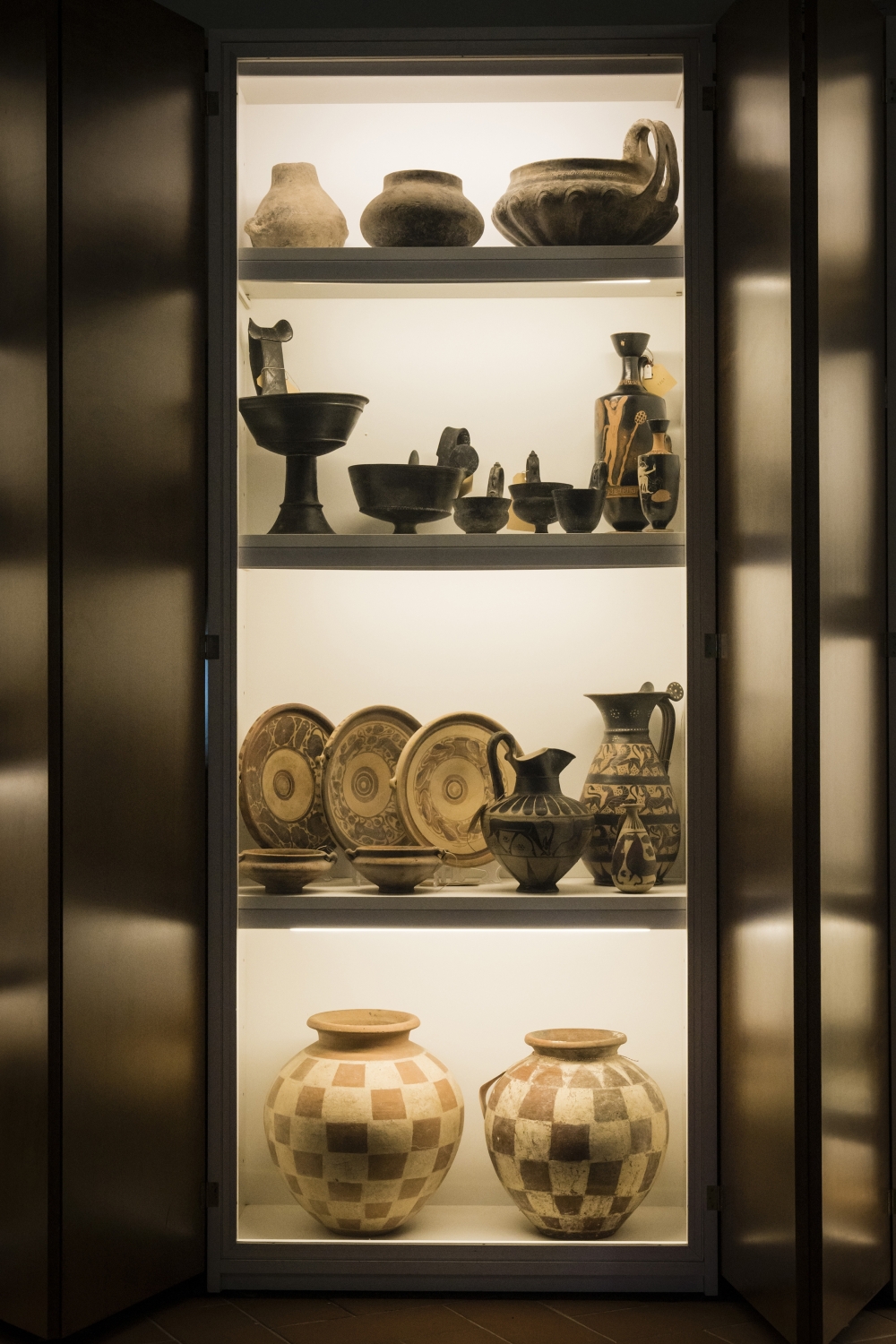Artifacts on display at Case Grifoni, a museum in Cerveteri, Italy, which has treasured works of art but does not have regular visiting hours, July 14, 2022. (Gianni Cipriano/The New York Times)