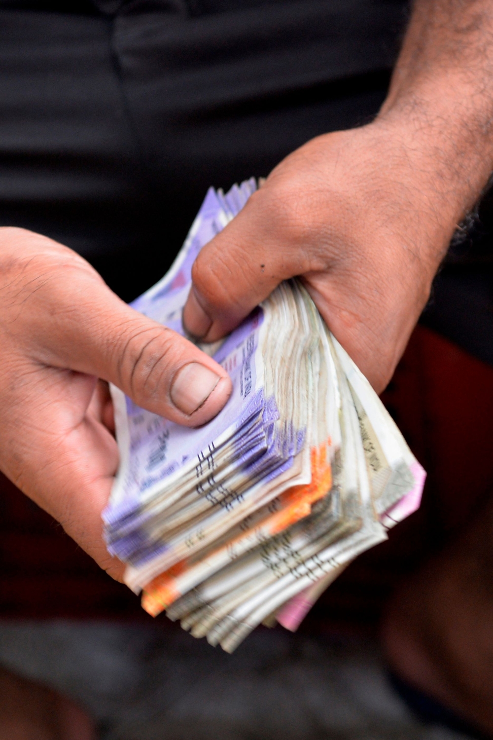 The Indian rupee fell to more than 80 per US dollar for the first time on record on July 19. 