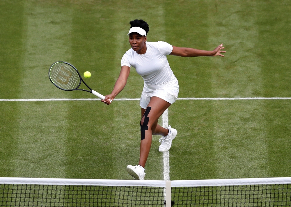 FILE PHOTO: Tennis - Wimbledon - All England Lawn Tennis and Croquet Club, London, Britain - June 30, 2021 Venus Williams of the US in action during her second round match against Tunisia's Ons Jabeur REUTERS/Peter Nicholls/File Photo