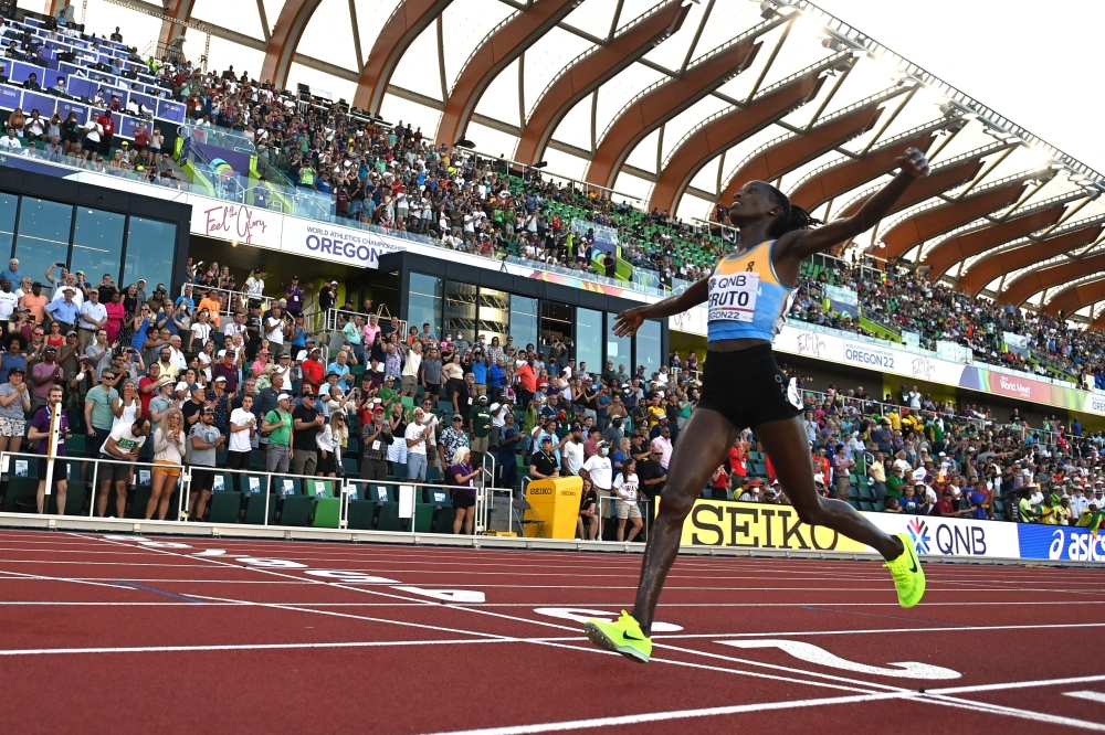 Kazakhstan's Norah Jeruto crosses the finish line in the women's 3,000m steeplechase final during the World Athletics Championships at Hayward Field in Eugene, Oregon on July 20, 2022.  (Photo by Jewel SAMAD                          / AFP)