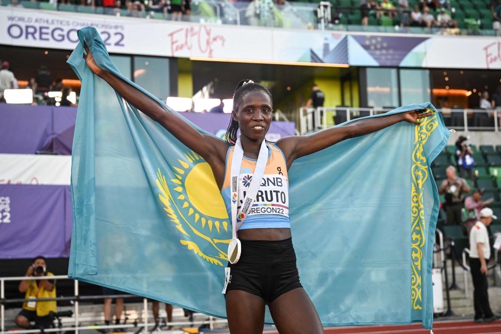 Kazakhstan's Norah Jeruto celebrates after winning the women's 3,000m steeplechase final during the World Athletics Championships at Hayward Field in Eugene, Oregon on July 20, 2022.  (Photo by Ben Stansall / AFP)