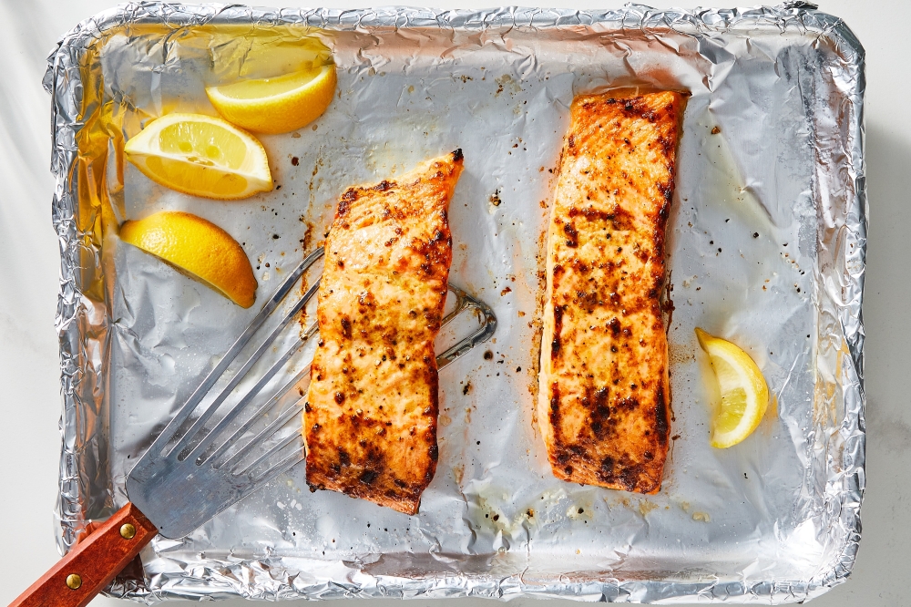A broiled salmon with mustard and lemon. (Julia Gartland/The New York Times)