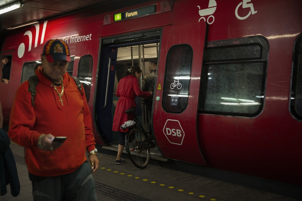 Train passengers in Copenhagen, Denmark, who are able bring bicycles aboard on Sept. 5, 2019. (Charlotte de la Fuente/The New York Times)