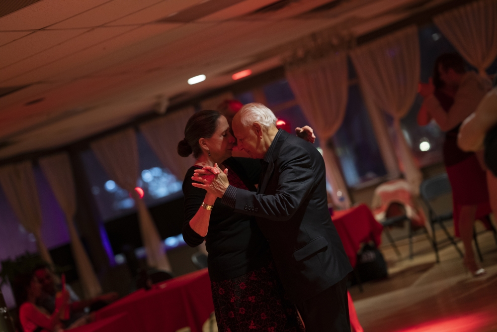 The journalist Nancy Cardwell and her husband, Luis Gallardo, dance tango at the Milonga Zandunga at the Capital Ballroom, in Bethesda, Md., on July 16, 2022. (Melissa Lyttle/The New York Times)