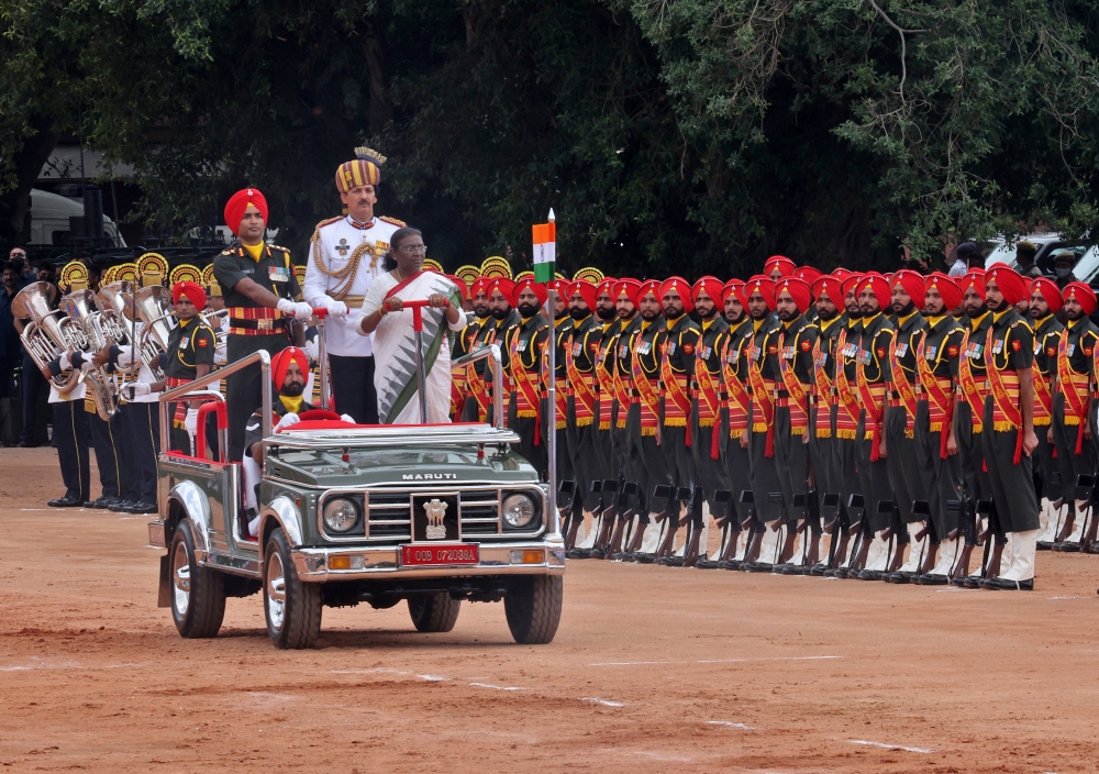 India's new President Droupadi Murmu inspects an honour guard after her swearing-in ceremony, at India's presidential palace Rashtrapati Bhavan in New Delhi. -- Reuters