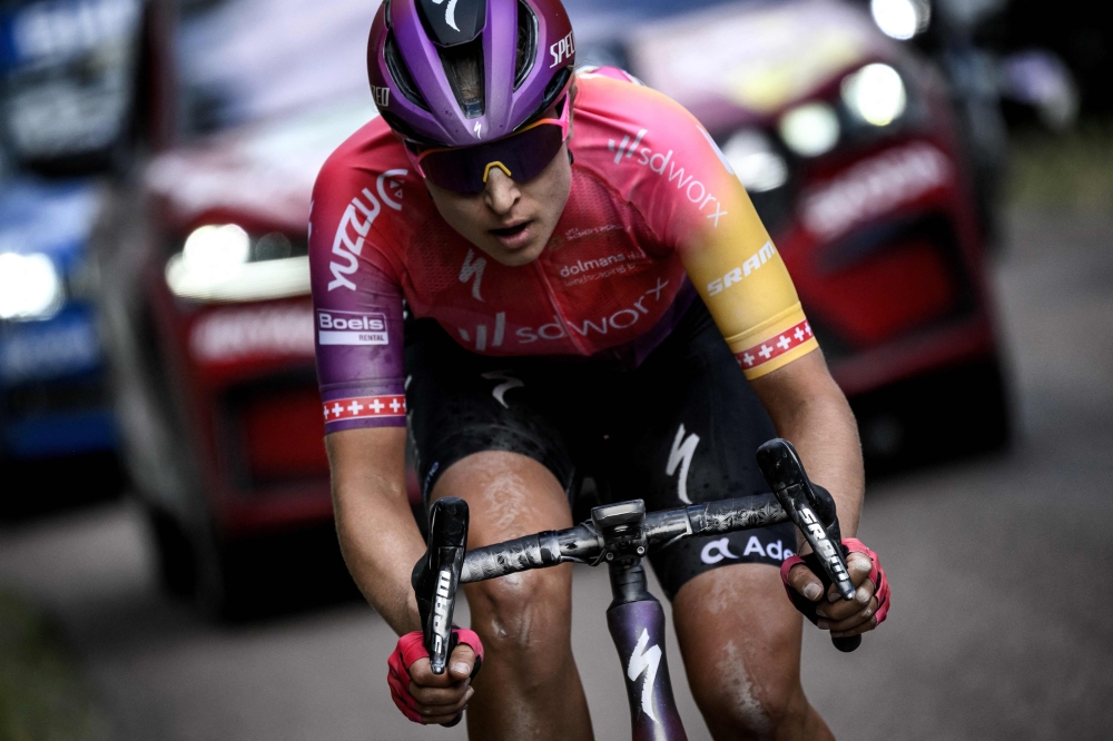 Team SD Worx's Swiss rider Marlen Reusser rides to win the 4th stage of the new edition of the Women's Tour de France cycling race, 126,8 km between Troyes and Bar-sur-Aube, eastern France, on July 27, 2022. (Photo by JEFF PACHOUD / AFP)