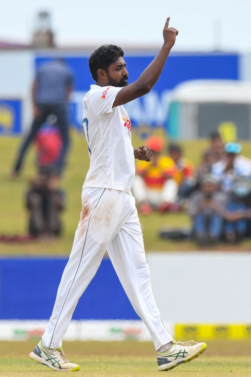Sri Lanka's Prabath Jayasuriya celebrates after taking the wicket of Pakistan's Yasir Shah during the final day of the second cricket Test match between Sri Lanka and Pakistan at the Galle International Cricket Stadium in Galle on July 28, 2022. (Photo by ISHARA S. KODIKARA / AFP)