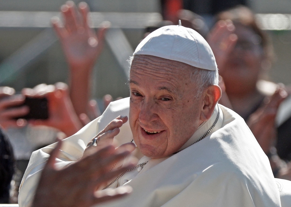 Pope Francis arrives at the National Shrine of Sainte-Anne-de-Beaupré in Quebec, Canada, where he was to celebrate Mass on Thursday.-- AFP