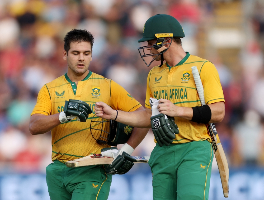 Cricket - T20 Series - England v South Africa - Sophia Gardens, Cardiff, Wales, Britain - July 28, 2022 South Africa's Rilee Rossouw and Tristan Stubbs celebrate after their innings Action Images via Reuters/Paul Childs