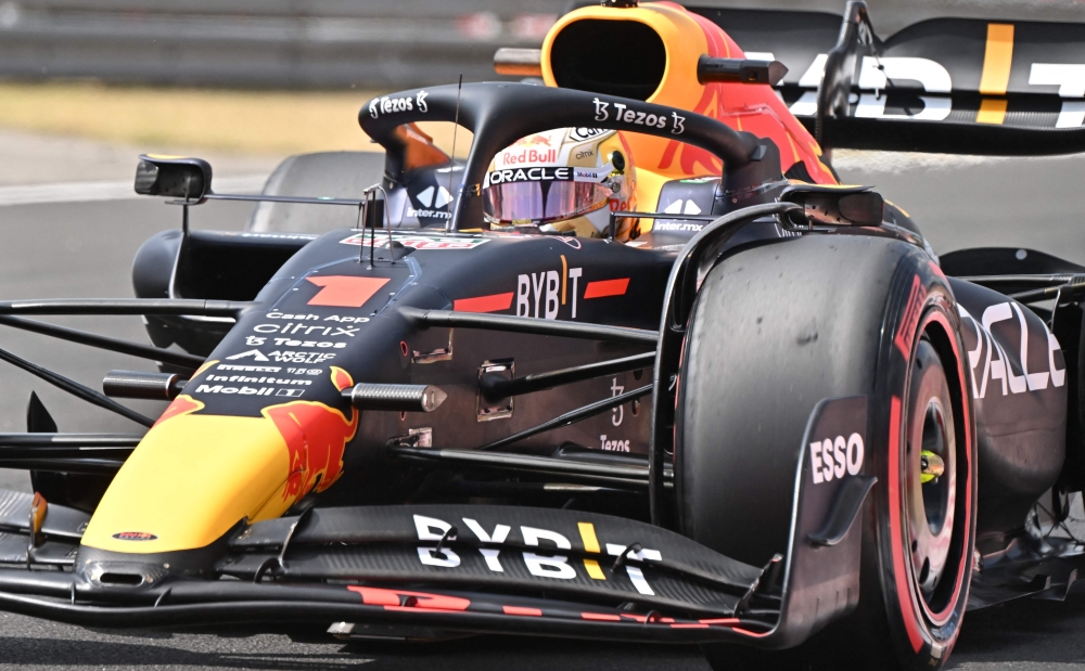 Red Bull Racing's Dutch driver Max Verstappen drives during the first practice session ahead of the Formula One Hungarian Grand Prix at the Hungaroring in Budapest, Hungary, on July 29, 2022. Red Bull Racing's Dutch driver Max Verstappen (Photo by ATTILA KISBENEDEK / AFP)

