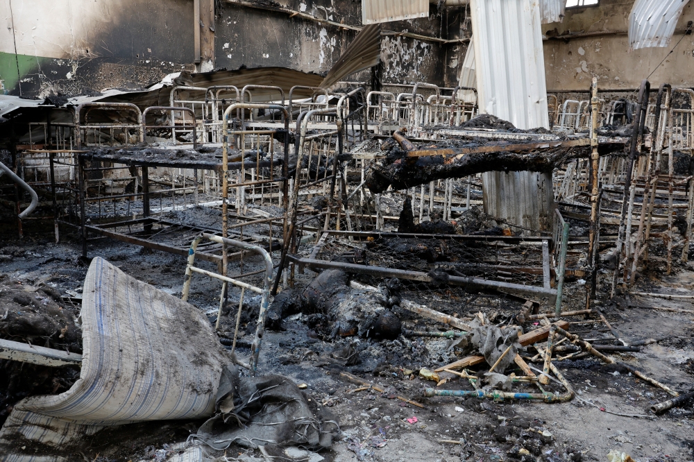 Burnt bodies of detainees lie among debris following the shelling at a pre-trial detention centre in the course of Ukraine-Russia conflict, in the settlement of Olenivka in the Donetsk region, Ukraine, on Friday. - Reuters
