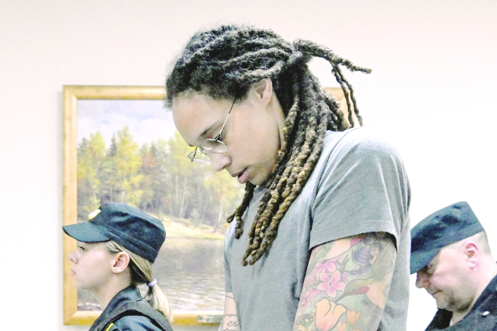 Brittney Griner leaves the courtroom after the court's verdict in Khimki outside Moscow, on Thursday. -- AFP