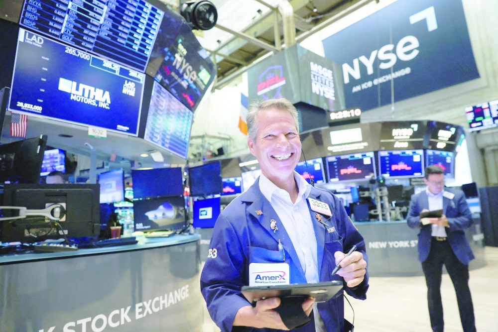 A trader works on the trading floor at the New York Stock Exchange (NYSE) in Manhattan, New York City. - Reuters 