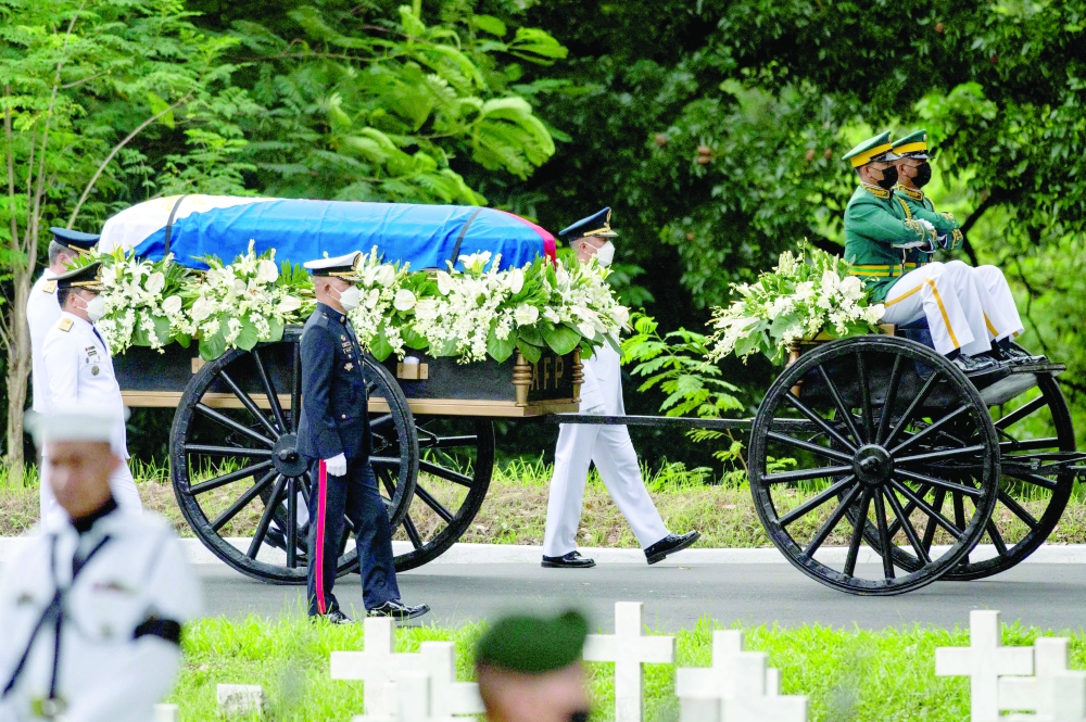 Soldiers transport the casket carrying the urn of Fidel Ramos during the state funeral at the Heroes Cemetery in Taguig, metro Manila, on Tuesday. - AFP