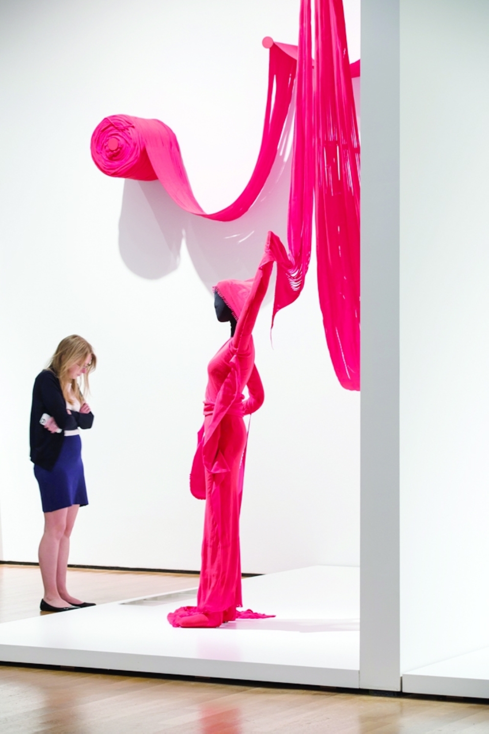 The A-POC Queen ensemble, with gloves and bag, 1997, displayed as part of the Museum of Modern Arts exhibit, Items: Is Fashion Modern? in New York, Sept. 26, 2017. (Mark Wickens/The New York Times)