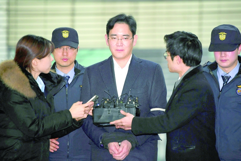Lee Jae-Yong, vice chairman of Samsung Electronics, arrives for questioning at the office of a special prosecutor investigating a corruption scandal in Seoul. - AFP file photo