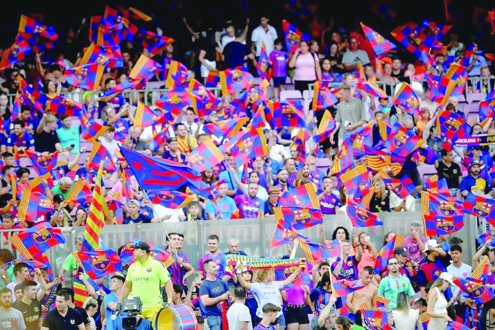 Struggling Barcelona sells part of media prod