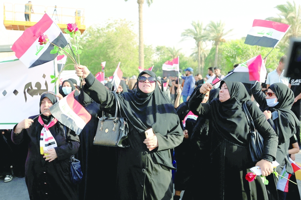 Supporters of the Coordination Framework gather during a protest, amid a political crisis, near Green Zone, in Baghdad, on Friday. - Reuters
