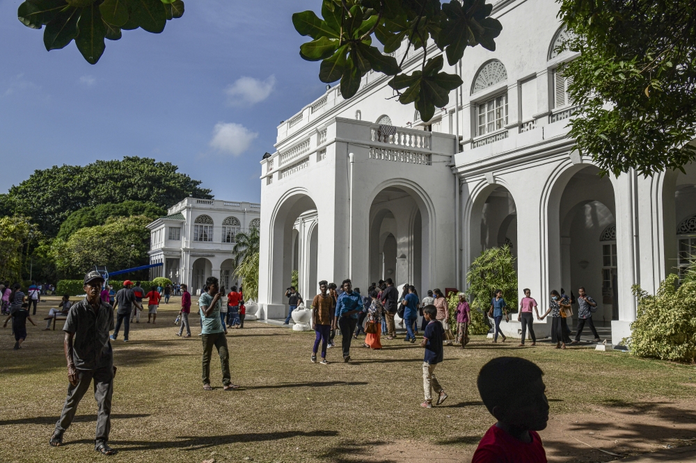 People at the president’s residence in Colombo, Sri Lanka, on July 12, 2022. (Atul Loke/The New York Times)