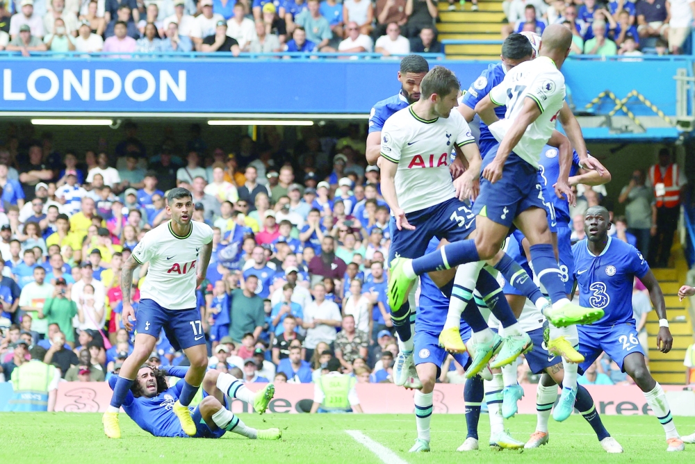 Chelsea's Marc Cucurella reacts after having his hair pulled by Tottenham Hotspur's Cristian Romero. -- Reuters