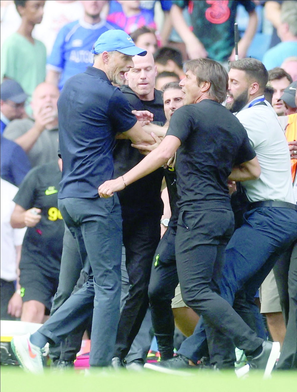Chelsea manager Thomas Tuchel and Tottenham Hotspur manager Antonio Conte clash after the match. -- Reuters