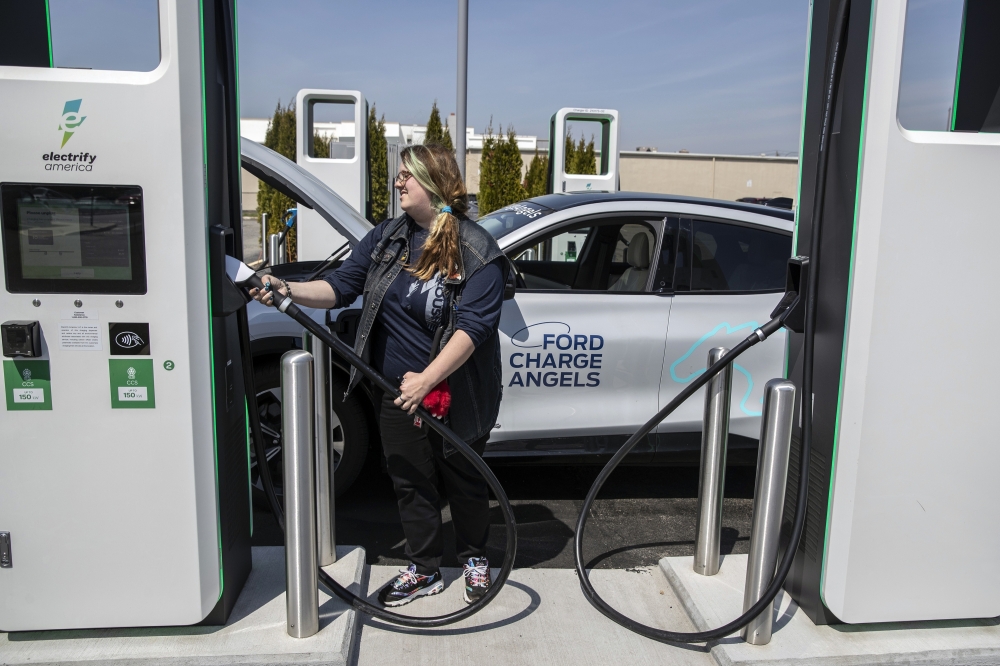 Nicole Larsen  is part of a team deployed by Ford to test the charging networks it has a partnership with. (Victor J. Blue/The New York Times)