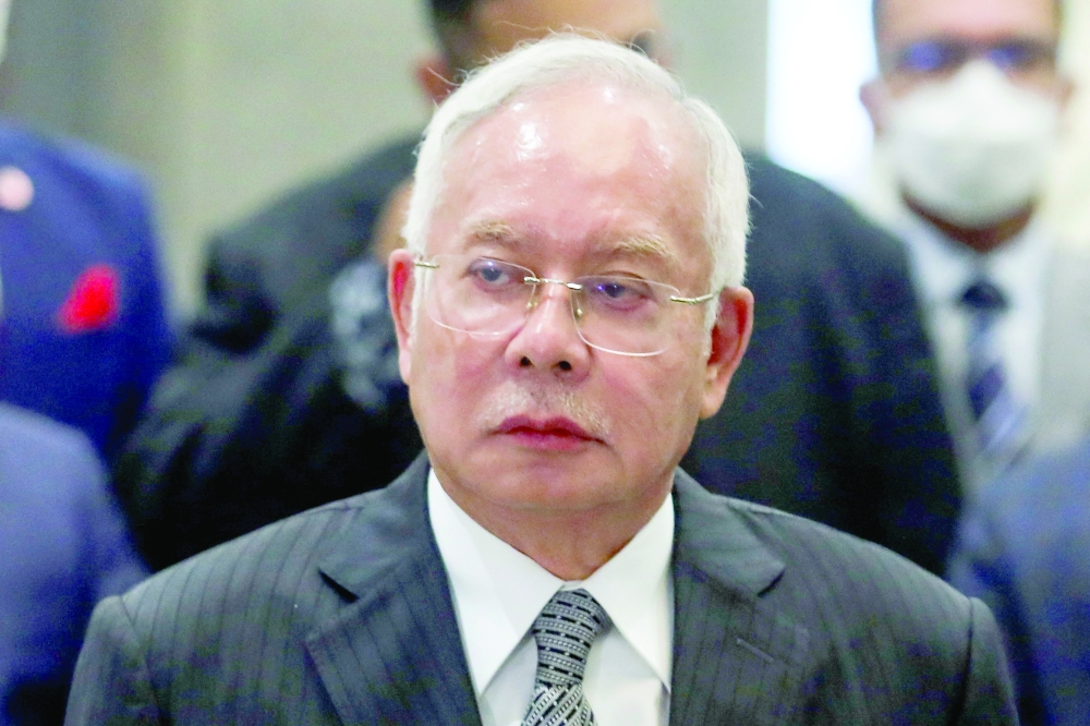 Najib Razak attends a news conference at the Federal Court in Putrajaya on Tuesday. - Reuters