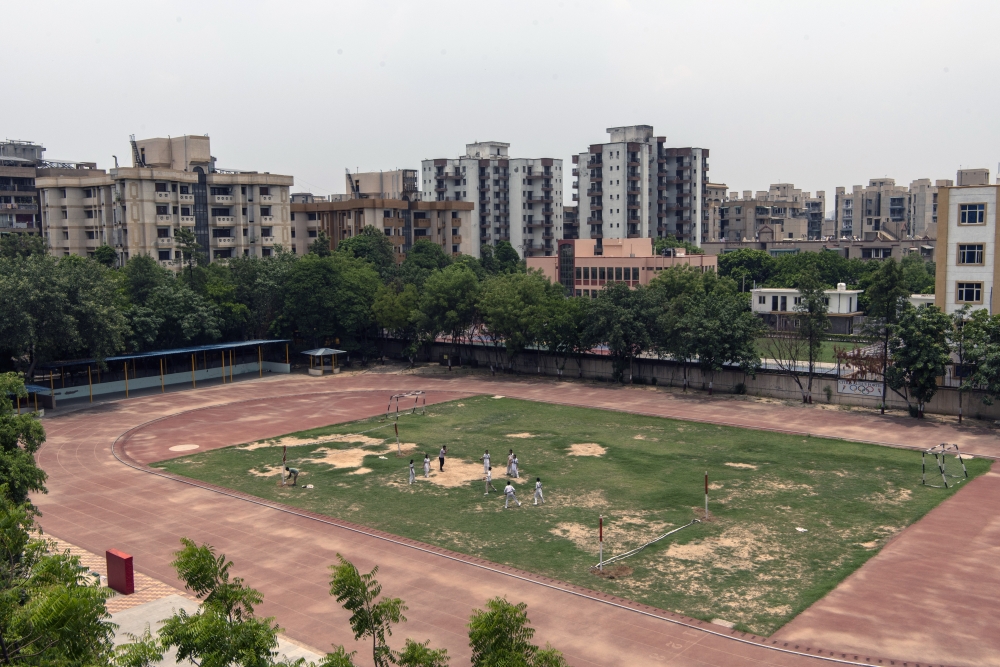A sports field at the School of Specialized Excellence in the Dwarka area of New Delhi on July 6, 2022. Delhi has used new education funding to build new classrooms, laboratories and running tracks, as well as to develop curriculums and create a new board of education.  (Saumya Khandelwal/The New York Times)