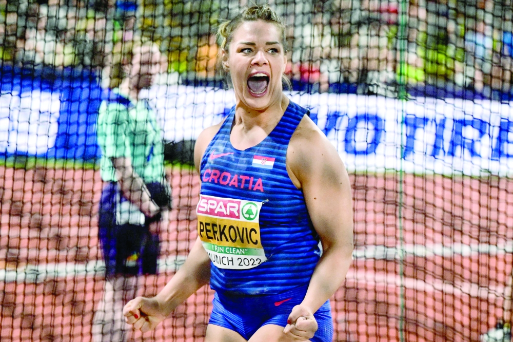TOPSHOT - Croatia's Sandra Perkovic celebrates winning a gold in the women's Discus Throw final during the European Athletics Championships at the Olympic Stadium in Munich, southern Germany on August 16, 2022. (Photo by ANDREJ ISAKOVIC / AFP)

